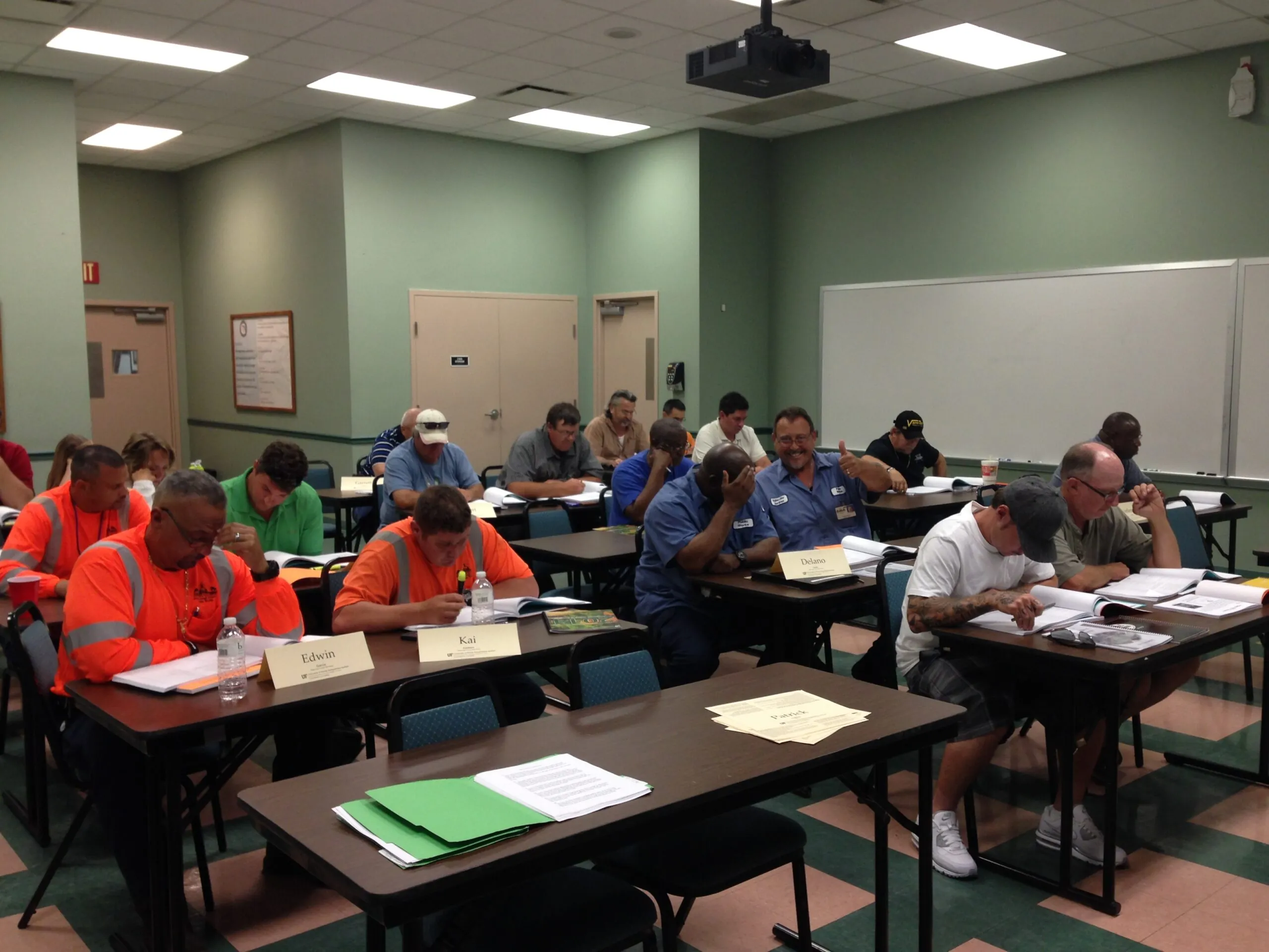 Public works professionals participating in an instructor-led classroom training session.